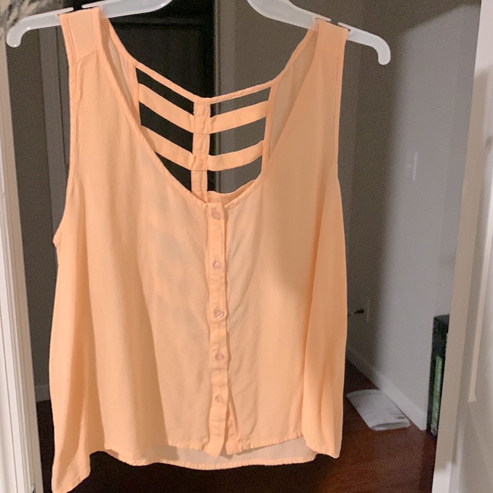 Light salmon tank top with open window back